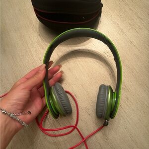 BEATS Green and Gray Wired Headphones with case and charger on ear